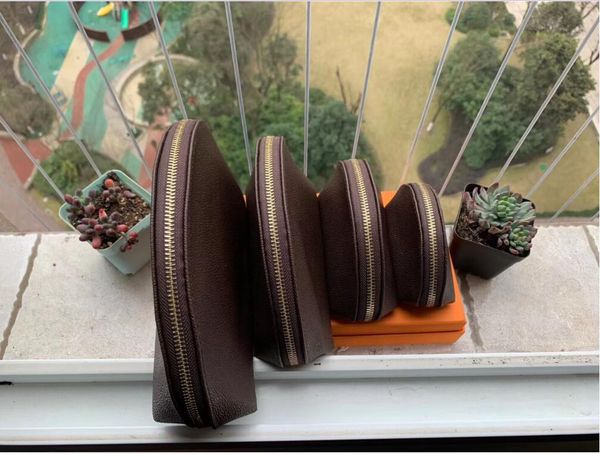 women cosmetic bags organizer famous makeup bag travel pouch make up ladies cluch purses organizador toiletry 4pcs 2021 classic 
women cosmetic bags organizer famous makeup bag travel pouch make up ladies cluch purses organizador toiletry 4pcs 2021 classic