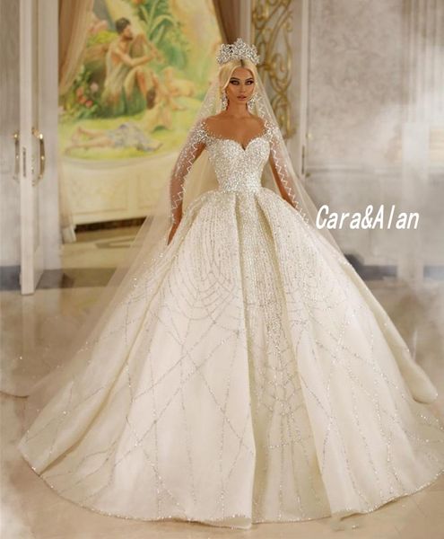 luxury arabic dubai wedding dresses for women 2021 sequin beaded long sleeves sheer neck bridal gowns vestido de noiva, White
luxury arabic dubai wedding dresses for women 2021 sequin beaded long sleeves sheer neck bridal gowns vestido de noiva, White