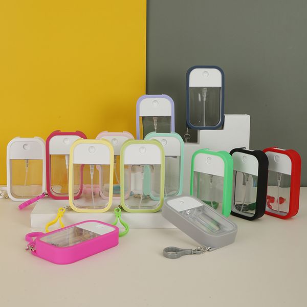 new fashion colorful silicone keychain portable hand sanitizer perfume bottle key chain bag pendant key ring, Silver 
new fashion colorful silicone keychain portable hand sanitizer perfume bottle key chain bag pendant key ring, Silver