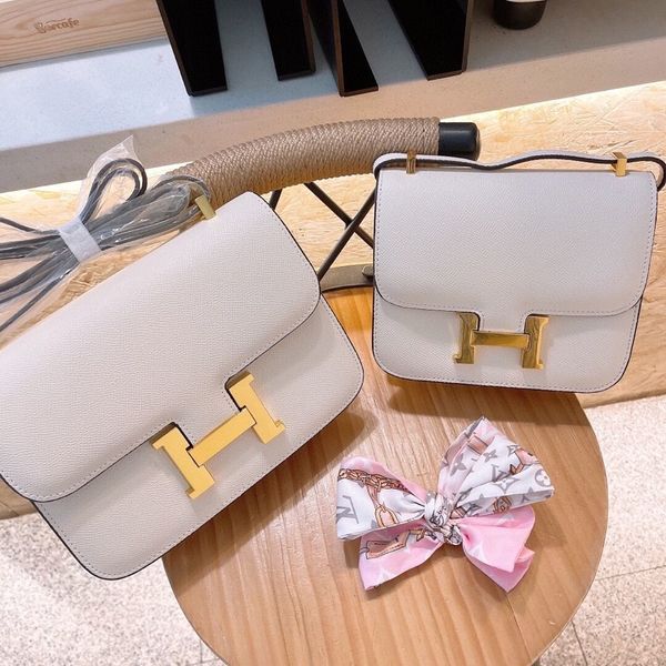 luxurys designer handbags stewardess 2021 female h button kangkang bags real leather tofu small square single shoulder messenger versatile b
luxurys designer handbags stewardess 2021 female h button kangkang bags real leather tofu small square single shoulder messenger versatile b