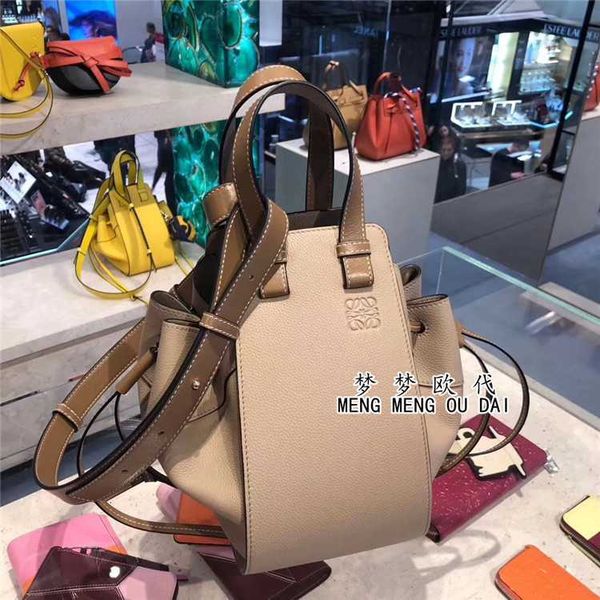 luo yiwei women's bag mini hammock bucket one shoulder straddle hand
luo yiwei women's bag mini hammock bucket one shoulder straddle hand