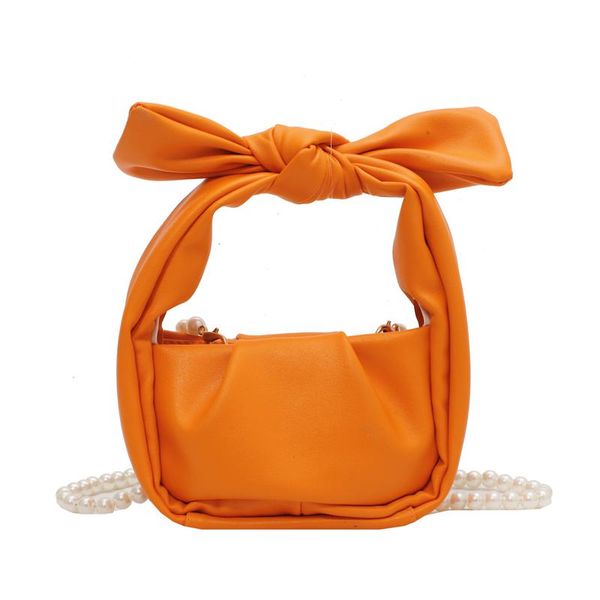 evening bags summer solid color mini bow tote bag 2021 fashion women's shoulder pearl chain wild crossbody fold 
evening bags summer solid color mini bow tote bag 2021 fashion women's shoulder pearl chain wild crossbody fold