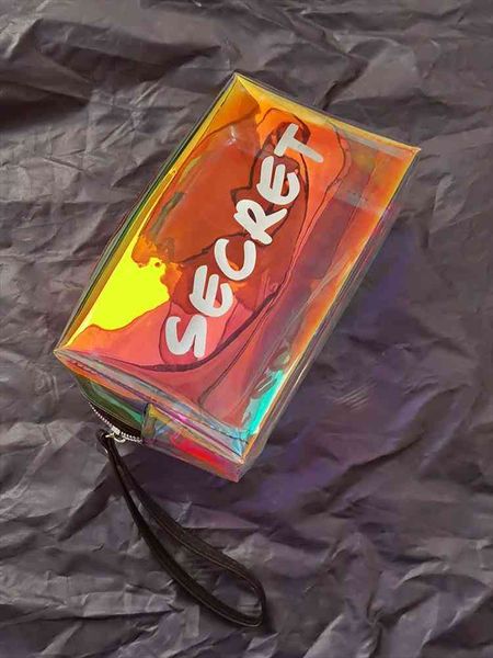 laser deisgn transparent travel bag female letter waterproof jelly bag pvc cosmetic organizer 727-2
laser deisgn transparent travel bag female letter waterproof jelly bag pvc cosmetic organizer 727-2