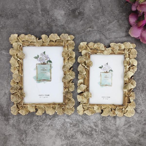 golden ginkgo leaf po frame european creative knot wedding retro bedroom set up like ornament decoration frames
golden ginkgo leaf po frame european creative knot wedding retro bedroom set up like ornament decoration frames