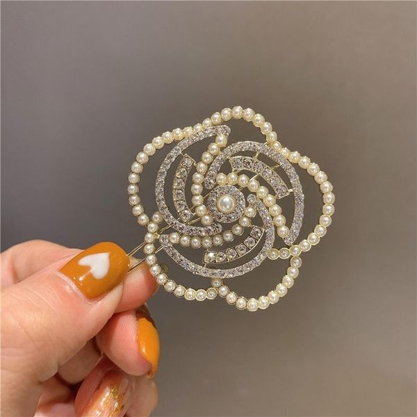 korea pearl rhinestone flower hairpin side clip camellia sweet romantic for women girl hair accessories clips & barrettes, Golden;silver
korea pearl rhinestone flower hairpin side clip camellia sweet romantic for women girl hair accessories clips & barrettes, Golden;silver