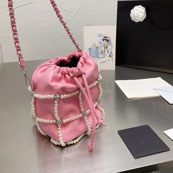 mini bags pearl chain drawstring shoulder bag crossbody fashion brand high-quality 6 different colors with exquisite packaging and original
mini bags pearl chain drawstring shoulder bag crossbody fashion brand high-quality 6 different colors with exquisite packaging and original