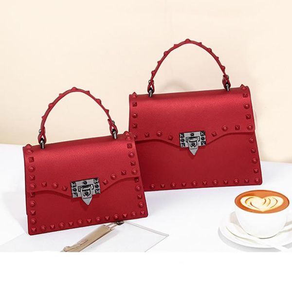 european and american autumn/winter fashion jelly bag frosted matte pvc female trend color rivet single-shoulder messenger bags
european and american autumn/winter fashion jelly bag frosted matte pvc female trend color rivet single-shoulder messenger bags