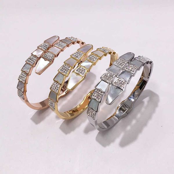 high end snake cuff bracelet shell zircon serpent female bangle fine jewelry ophidian hand accessories wrist ornament women q0720, Black
high end snake cuff bracelet shell zircon serpent female bangle fine jewelry ophidian hand accessories wrist ornament women q0720, Black