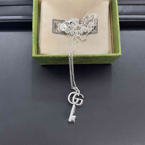 double key necklace made old thai silver letter carved pattern pendant couple's clavicle chain
double key necklace made old thai silver letter carved pattern pendant couple's clavicle chain
