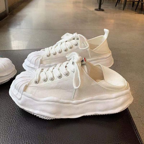 net red thick soled canvas dissolve shoe female ins tide step on the heel 2022 new sponge cake light shell head shoe, Black
net red thick soled canvas dissolve shoe female ins tide step on the heel 2022 new sponge cake light shell head shoe, Black