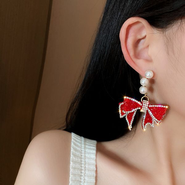 925 silver needle full diamond bow pearl earrings net red fashion temperament sweet girl heart wind, Golden
925 silver needle full diamond bow pearl earrings net red fashion temperament sweet girl heart wind, Golden