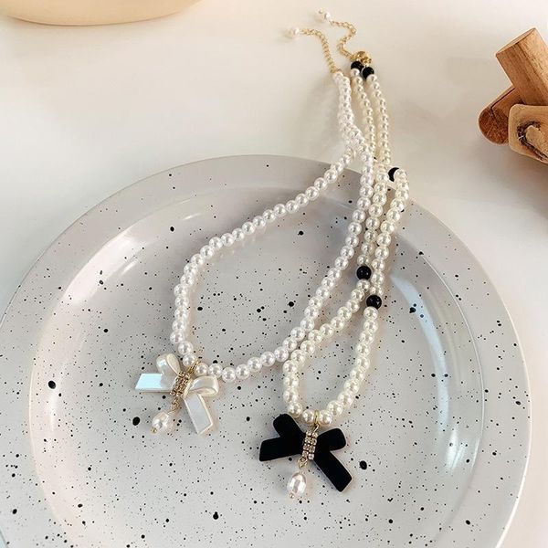 pendant necklaces origin summer french vintage black white bowknot necklace for women imitation pearl beaded rhinestone jewelry, Silver
pendant necklaces origin summer french vintage black white bowknot necklace for women imitation pearl beaded rhinestone jewelry, Silver
