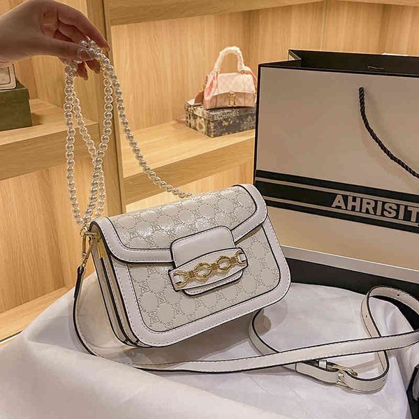 2022 factory wholesale handbag embossed single shoulder women's small square sweet pearl chain portable bag
2022 factory wholesale handbag embossed single shoulder women's small square sweet pearl chain portable bag