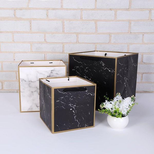 gift wrap 12pcs boxes marble style bag kraft paper box for flower packing with string square cases wedding packaging
gift wrap 12pcs boxes marble style bag kraft paper box for flower packing with string square cases wedding packaging