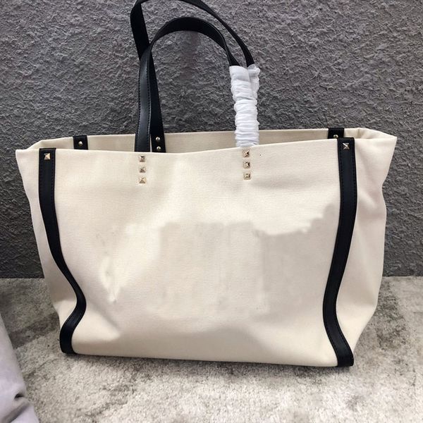 women single shoulder handbag large tote bags canvas shopping bag classic rivet inlay pouch
women single shoulder handbag large tote bags canvas shopping bag classic rivet inlay pouch