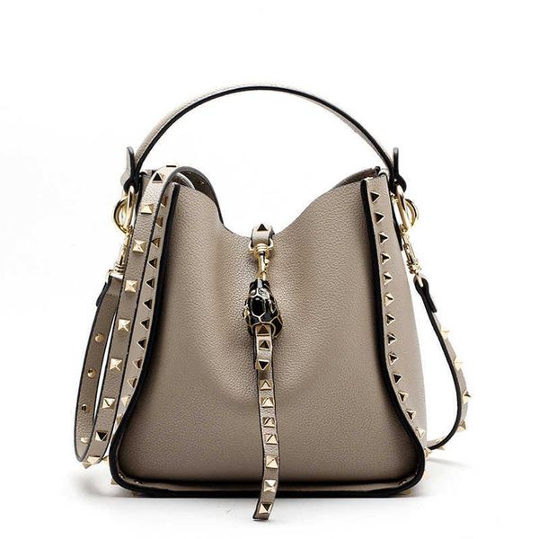women designer selling 2021 fashion luxury women's bucket bag genuine leather ladies rivet handbags female shoulder wallet casual
women designer selling 2021 fashion luxury women's bucket bag genuine leather ladies rivet handbags female shoulder wallet casual