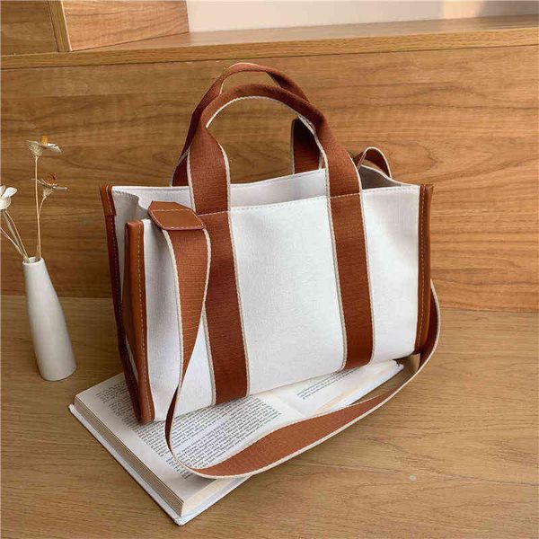 shopping bags canvas tote new simple retro handbag women's wide shoulder strap ssenger luxury designer large travel purse 220307
shopping bags canvas tote new simple retro handbag women's wide shoulder strap ssenger luxury designer large travel purse 220307