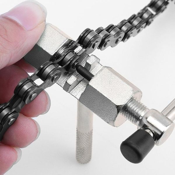 tools bike chain cutter tool breaker road mtb bicycle hand repair removal pin splitter device cycling accessories 
tools bike chain cutter tool breaker road mtb bicycle hand repair removal pin splitter device cycling accessories