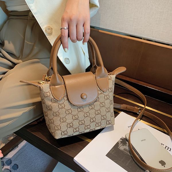 design korean single shoulder fashion pattern small 2021 autumn new splicing ear bag
design korean single shoulder fashion pattern small 2021 autumn new splicing ear bag