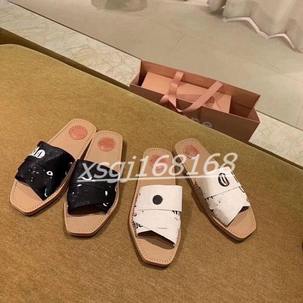 2021 fashion summer canvas flat slippers ladies sandals wooden square head cross strap letter print flip flop, Black
2021 fashion summer canvas flat slippers ladies sandals wooden square head cross strap letter print flip flop, Black
