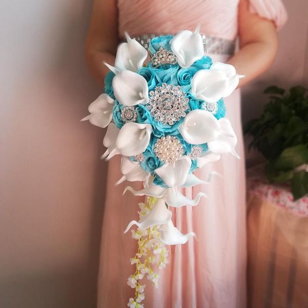 wedding flowers arrvial 2021 lake blue rose with white calla lilies crystal pearls beads waterfall bouquet for bride
wedding flowers arrvial 2021 lake blue rose with white calla lilies crystal pearls beads waterfall bouquet for bride