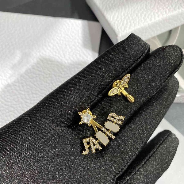 charms women's asymmetric golden bee letter lady's exquisite earrings daily stud fashion
charms women's asymmetric golden bee letter lady's exquisite earrings daily stud fashion