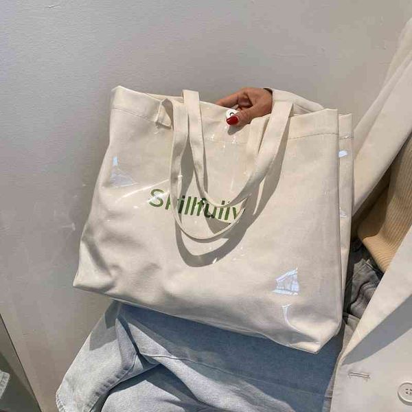 spring summer lady's bag 2021 fashion transparent large capacity canvas one shoulder tote bag
spring summer lady's bag 2021 fashion transparent large capacity canvas one shoulder tote bag