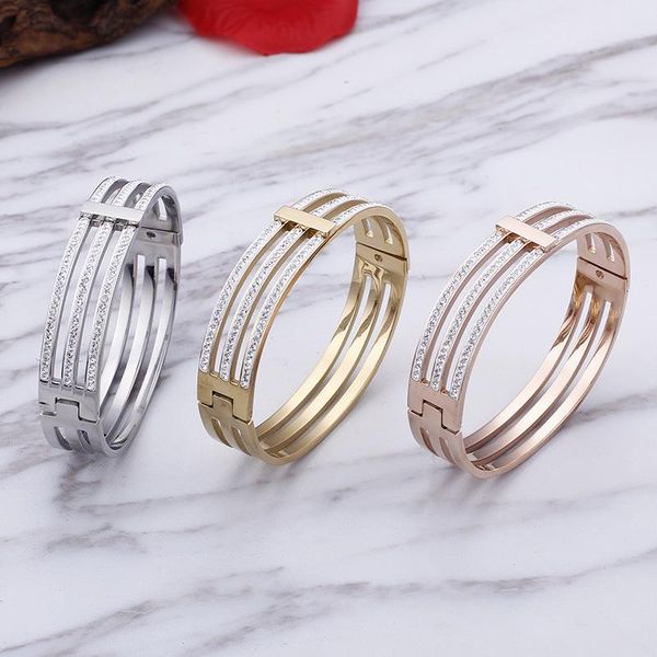 bangle fashion simple titanium steel bracelet with three layers of 18k gold inlaid brick, Black
bangle fashion simple titanium steel bracelet with three layers of 18k gold inlaid brick, Black