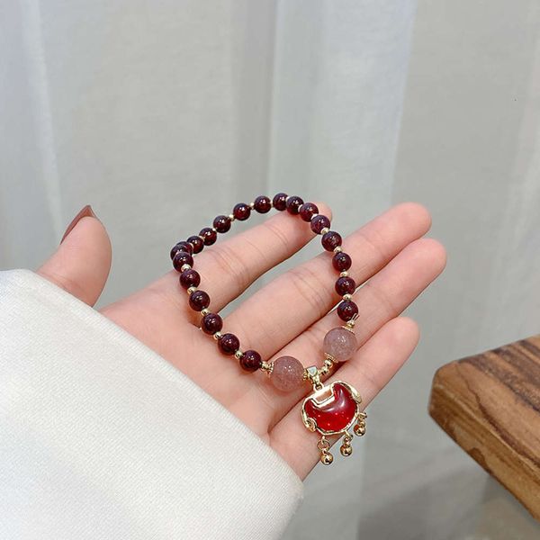 pomegranate bracelet fashion red long life chain personalized chinese wind net hand ornament, Black
pomegranate bracelet fashion red long life chain personalized chinese wind net hand ornament, Black