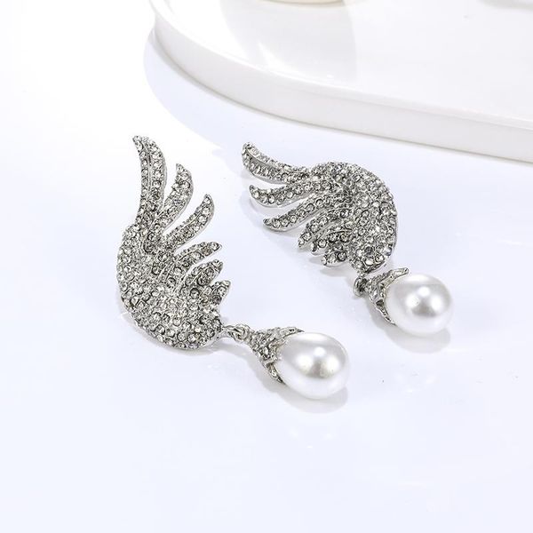 fashion simulated pearl earrings metal crystal angel wing stud for women girls accessories jewelry, Golden;silver
fashion simulated pearl earrings metal crystal angel wing stud for women girls accessories jewelry, Golden;silver