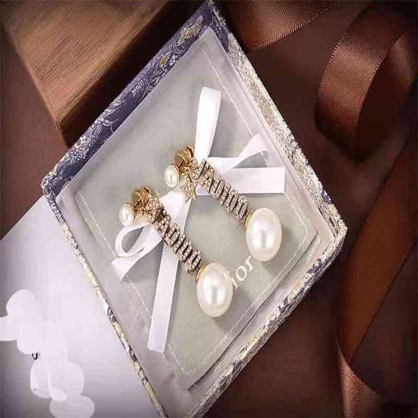 aaa designer jewelry parent's letter star studded pearl tassel 925 silver needle female earrings 8iek
aaa designer jewelry parent's letter star studded pearl tassel 925 silver needle female earrings 8iek