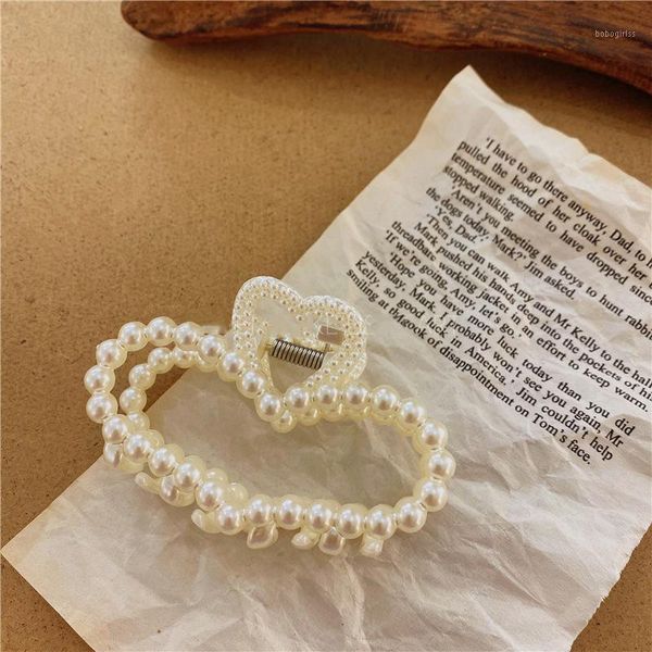 2021 korea fashion transparent acrylic geometric imitiation pearl hair crab for women hairpins claw clamp1
2021 korea fashion transparent acrylic geometric imitiation pearl hair crab for women hairpins claw clamp1