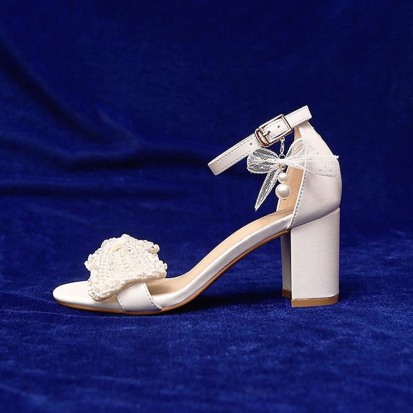dress shoes thick-heeled hollow summer pearl bow open-toe white bridal sandals with a buckle and sweet large size small female high hee, Black
dress shoes thick-heeled hollow summer pearl bow open-toe white bridal sandals with a buckle and sweet large size small female high hee, Black