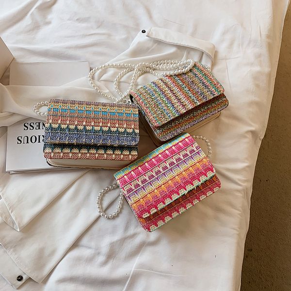 new handbags ethnic grass woven rainbow pearl chain single shoulder messenger square fashion small fresh literary and artistic women's
new handbags ethnic grass woven rainbow pearl chain single shoulder messenger square fashion small fresh literary and artistic women's