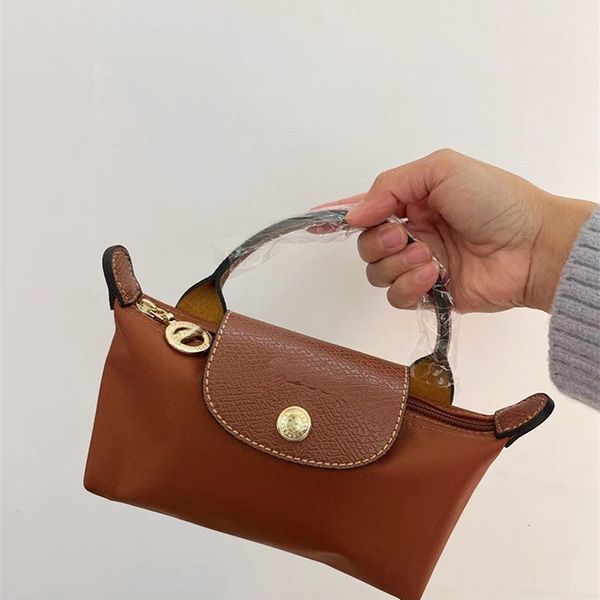 new handbags mini small bag french handbag single portable cognac lc short handle nylon cosmetic dumpling hand bags women clutches casual
new handbags mini small bag french handbag single portable cognac lc short handle nylon cosmetic dumpling hand bags women clutches casual