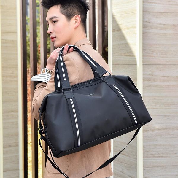 portable travel bag large capacity men's shoulder messenger waterproof business trip duffel bags
portable travel bag large capacity men's shoulder messenger waterproof business trip duffel bags