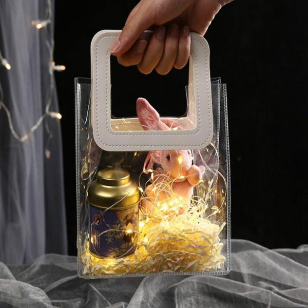 gift wrap pvc clear bag with leather handle high-quality transparent plastic bags hard package christmas accessories 21041001
gift wrap pvc clear bag with leather handle high-quality transparent plastic bags hard package christmas accessories 21041001