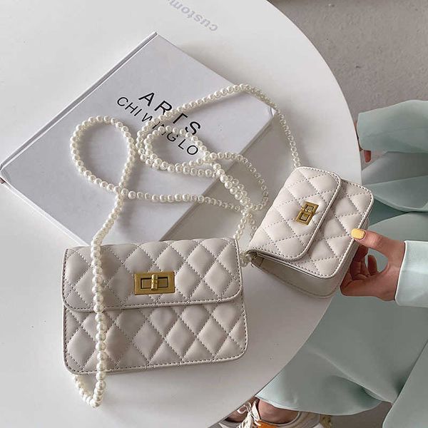 xiaoxiangfeng pearl chain bag women's 2021 advanced lingge small square fashion one shoulder msenger bag
xiaoxiangfeng pearl chain bag women's 2021 advanced lingge small square fashion one shoulder msenger bag