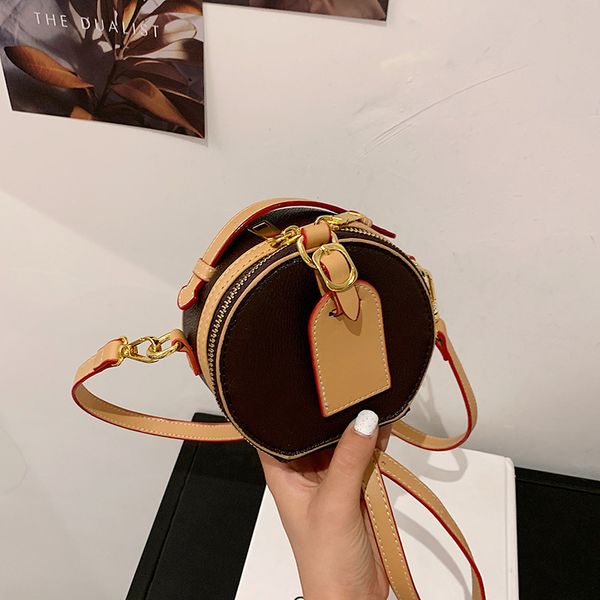 design handbag texture mini round bag 2021 new net red cake waist single shoulder messenger small change
design handbag texture mini round bag 2021 new net red cake waist single shoulder messenger small change
