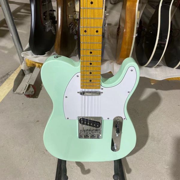 ele electric guitar maple fingerboard surf green color white pickguard chrome hardware high quality
ele electric guitar maple fingerboard surf green color white pickguard chrome hardware high quality