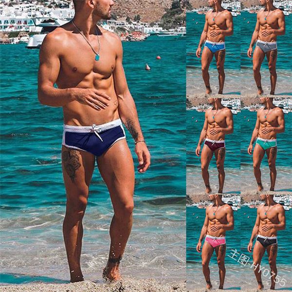 men's swimwear triangle solid color slim drawstring swimming trunks in summer of 2021
men's swimwear triangle solid color slim drawstring swimming trunks in summer of 2021