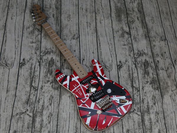 electric guitar, aged edward eddie van halen heavy rellc striped frankie, st shape maple neck, floyd rose tremolo & locking nut
electric guitar, aged edward eddie van halen heavy rellc striped frankie, st shape maple neck, floyd rose tremolo & locking nut