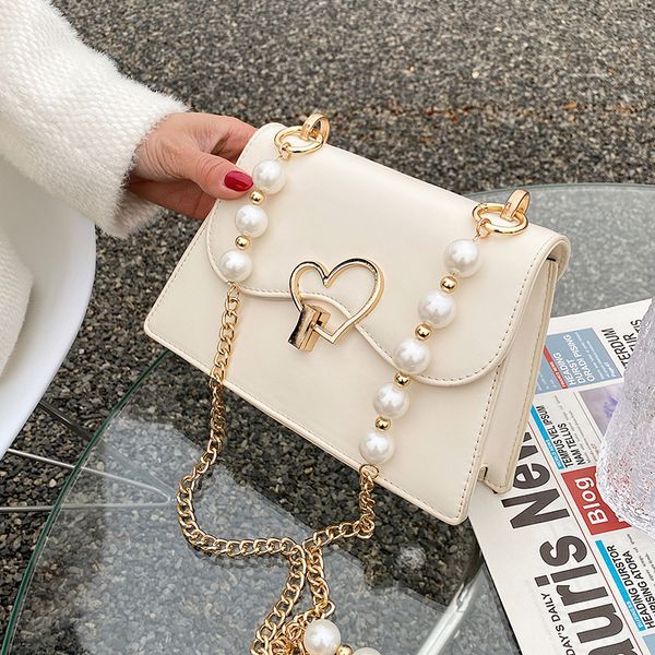 niche design womens messenger bag 2021 new fashion peach heart pearl chain square bag dual-use bag shoulder width 22cm
niche design womens messenger bag 2021 new fashion peach heart pearl chain square bag dual-use bag shoulder width 22cm
