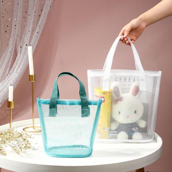 portable transparent mesh shopping bag household sundries storage bags woman cosmetics organizer
portable transparent mesh shopping bag household sundries storage bags woman cosmetics organizer