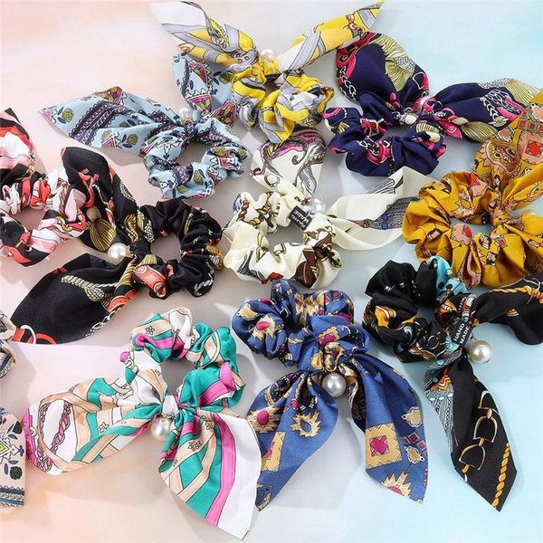 fashion silk bowknot print scrunchie headband elastic hair band women pearl scarf bow rope girls ties accessories1
fashion silk bowknot print scrunchie headband elastic hair band women pearl scarf bow rope girls ties accessories1