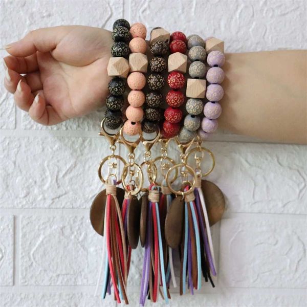 30pcs/dhl personalized leather tassel bracelet key ring chains wooden beaded wristlet bangle carved bead elastic wrist bands charm pendants, Red;brown
30pcs/dhl personalized leather tassel bracelet key ring chains wooden beaded wristlet bangle carved bead elastic wrist bands charm pendants, Red;brown
