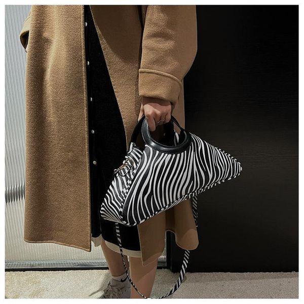 evening bags fashion 2022 triangle handbag tote women's luxury designer cow zebra pattern shoulder crossbody bag
evening bags fashion 2022 triangle handbag tote women's luxury designer cow zebra pattern shoulder crossbody bag