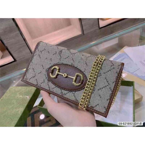 2022 factory outlet online clasp old flower chain zero wallet one shoulder cross mobile phone bag small square bag
2022 factory outlet online clasp old flower chain zero wallet one shoulder cross mobile phone bag small square bag