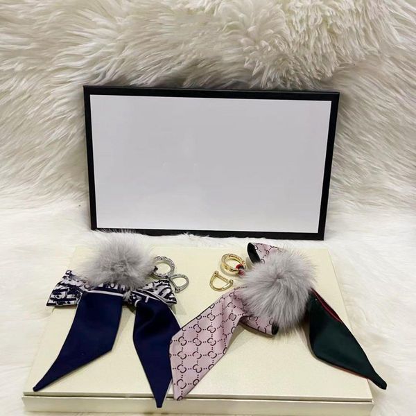 luxurys silk ribbon key chain bulingbuling buckle lovers car keychain handmade leather designers keychains men women bag pendant accessories, Silver
luxurys silk ribbon key chain bulingbuling buckle lovers car keychain handmade leather designers keychains men women bag pendant accessories, Silver