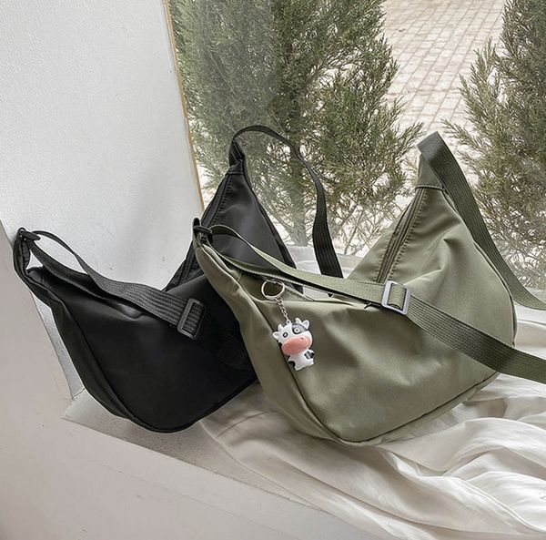 luxury dumpling bag female messenger canvas retro niche design korean version japanese wild underarm nylon shoulder bags
luxury dumpling bag female messenger canvas retro niche design korean version japanese wild underarm nylon shoulder bags